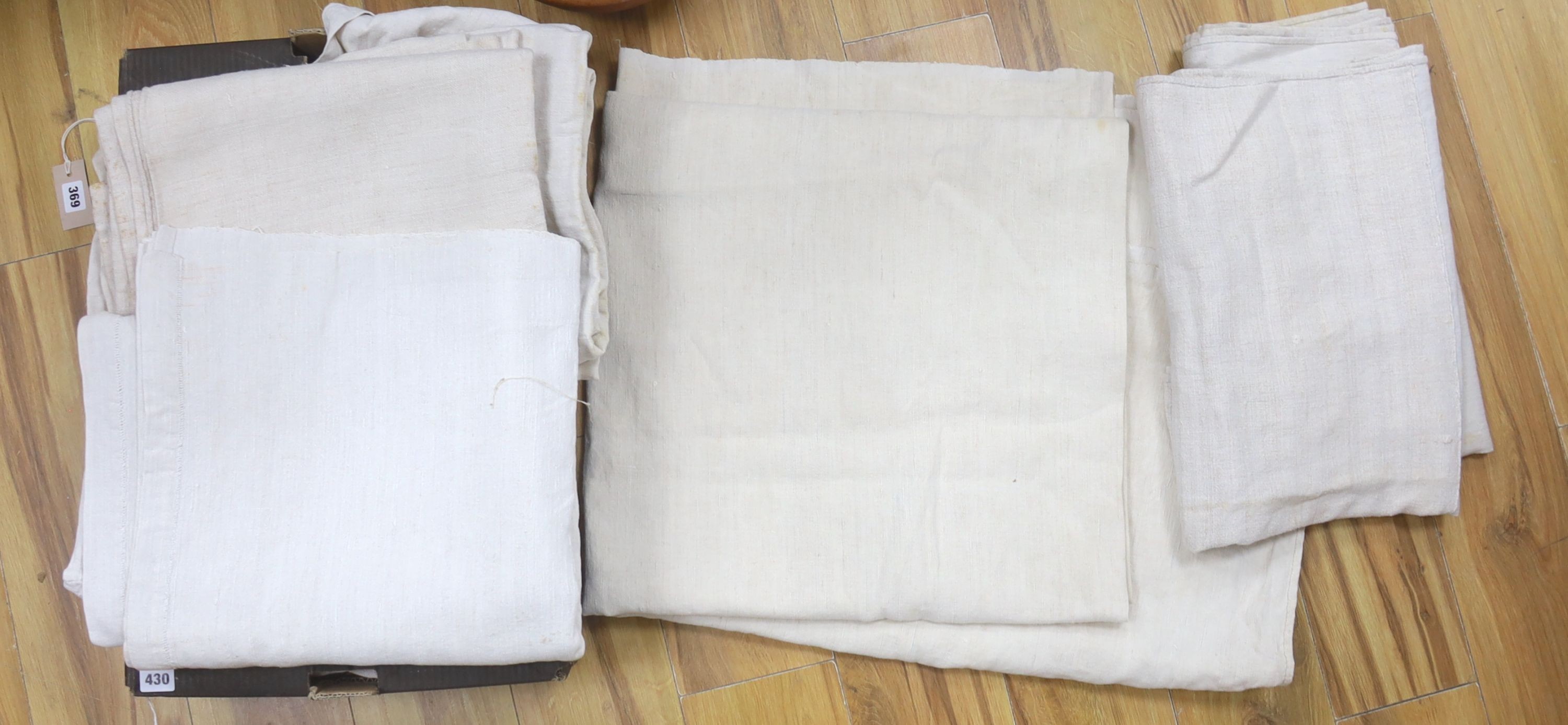 A collection of coarse French provincial linen sheets